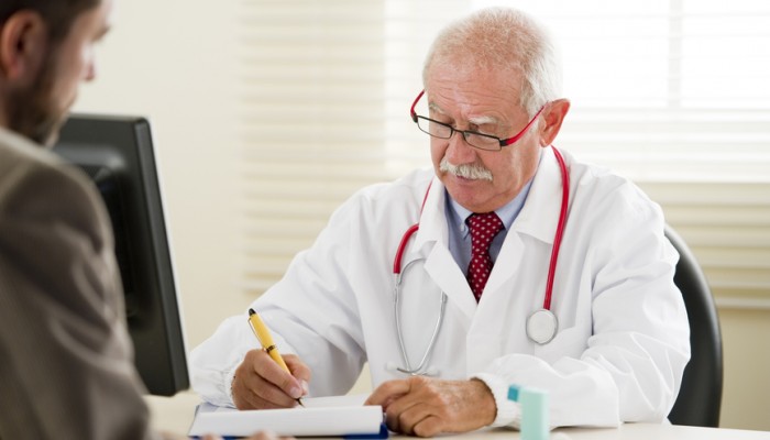 Senior doctor with his patient