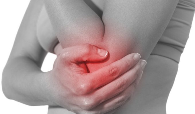 Acute pain in a woman elbow