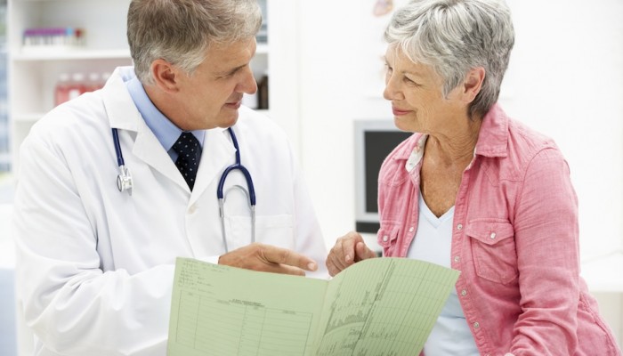 Doctor with female patient
